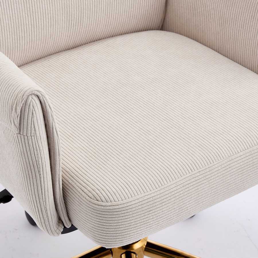 Close-up of white corduroy seat cushion on ergonomic office chair with golden base, highlighting soft texture and comfort.