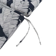 Navy blue fabric with white leaf pattern and a silver headband on a white background