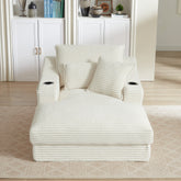 White textured sofa with cup holders in a living room setting