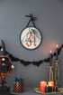 Halloween circle sign set of 2 with black ribbon, featuring October 31 date, spider web, and dotted border, perfect for seasonal home decor