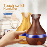 Wooden humidifier with touch switch on a white background