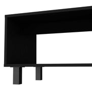 Side view of Hoven coffee table's open shelf and leg design, highlighting its sleek black finish and modern structure.