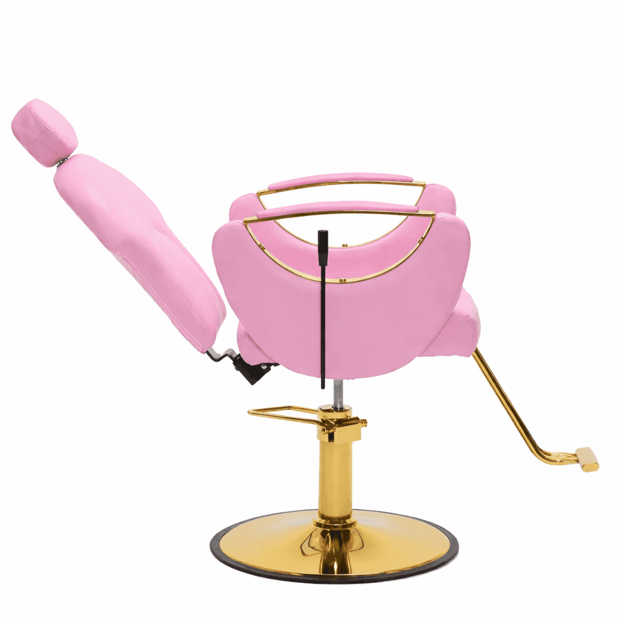 A pink barber chair with a gold metal base, foot pedal, and trim, shown on a plain white background.