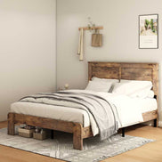 Angled view of full size wood platform bed frame with sturdy legs and under-bed storage, styled with neutral bedding and decor.
