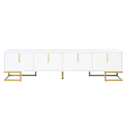 Front view of modern white and gold TV stand with four cabinet doors and gold base, ideal for upscale interiors.