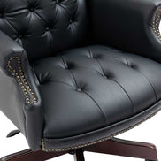 Black leather office chair with tufted design on a white background
