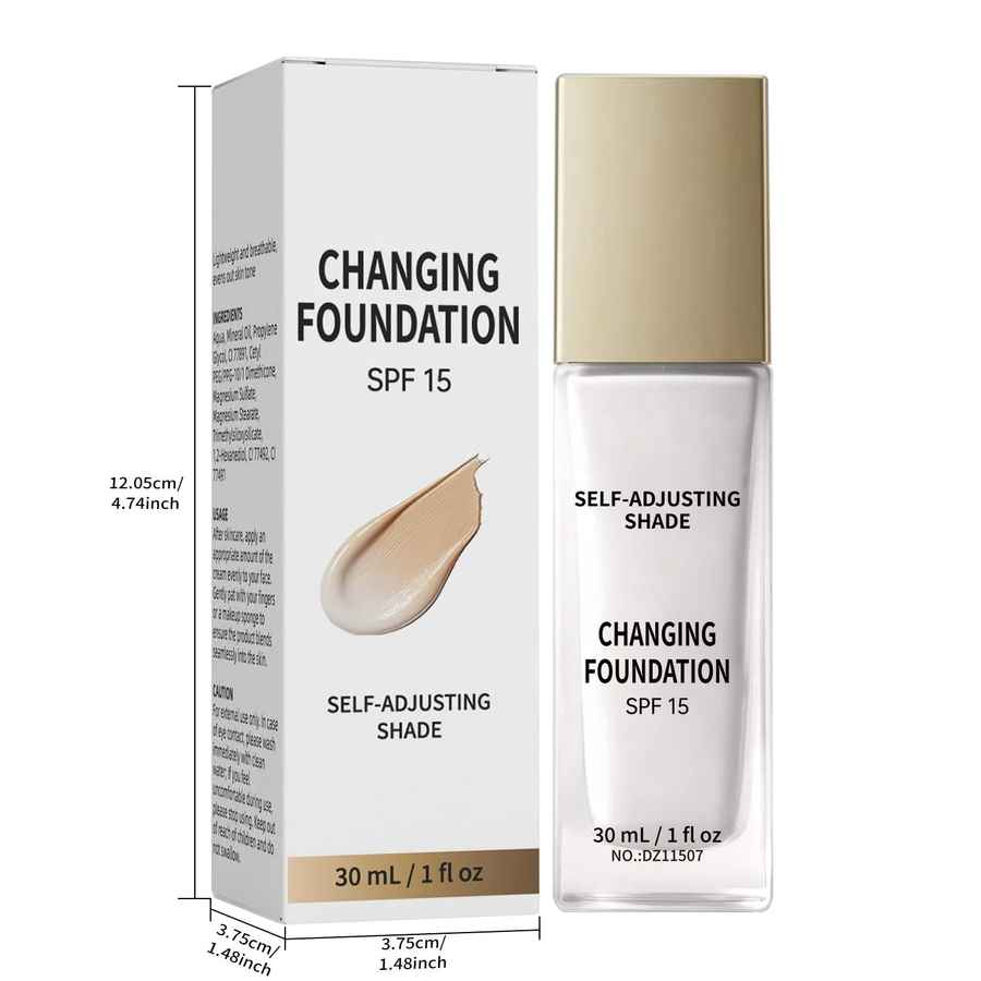 A 30 mL bottle and matching box of Changing Foundation SPF 15 Self-Adjusting Shade, shown on a white background with dimension annotations. The packaging is white with black text and a beige foundation smear graphic, and the bottle has a metallic gold cap and a clear glass base.