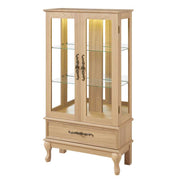 Tall lighted curio cabinet with glass doors, adjustable shelves, and bottom drawer in natural wood finish for stylish storage.