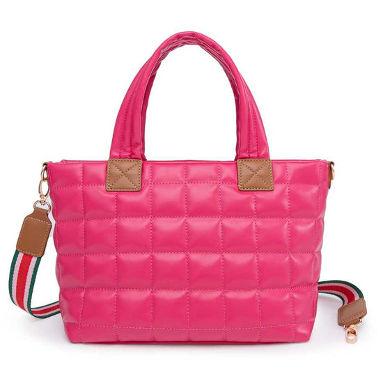 Pink quilted handbag with a strap on a white background