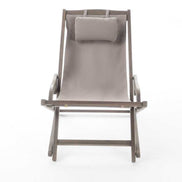 Gray lounge chair with a pillow on a white background