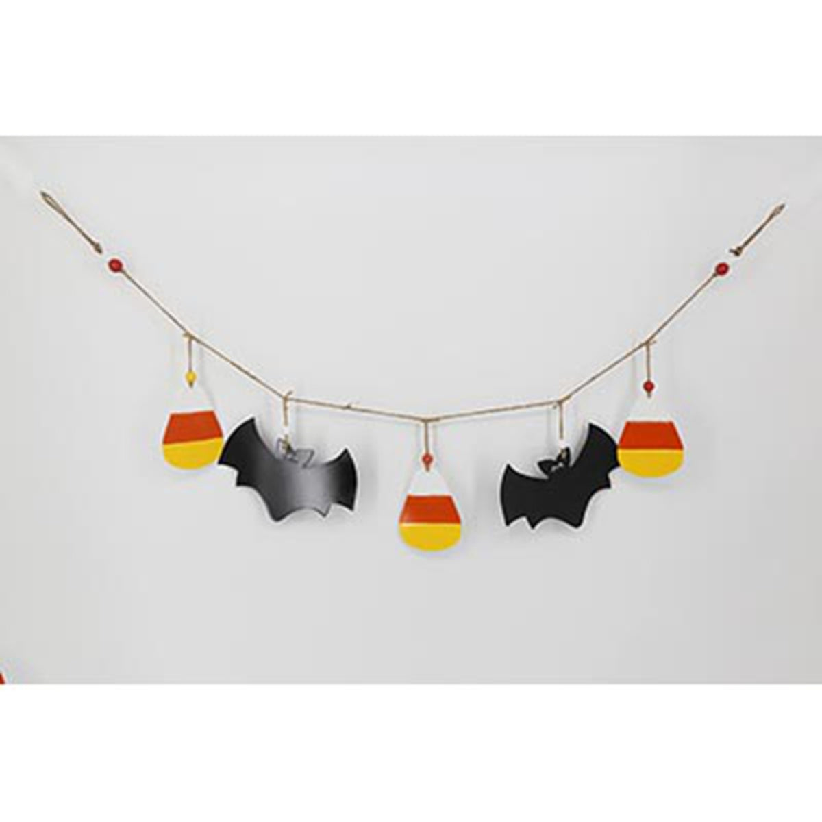 Halloween-themed decorative banner with bats and candy corn on a white background