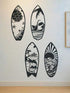 Metal surfboard wall art set featuring ocean-themed cutouts like sea turtles, sharks, and beach huts. Ideal for modern coastal home decor.