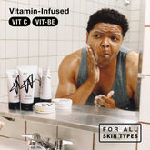 Person applying exfoliating face wash, showing skincare routine for all skin types