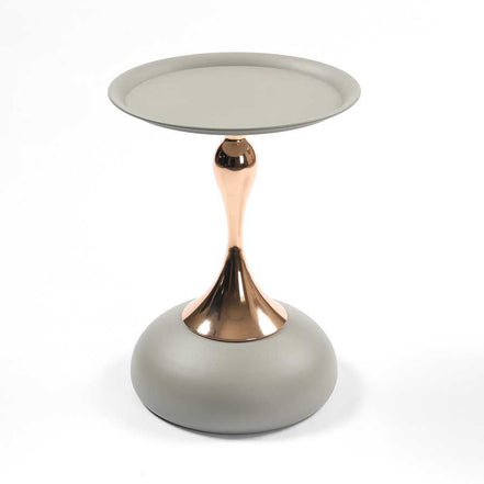 Full view of the Mermaid Tail Coffee Table with modern metal design, featuring a round grey top and gold sculptural base.