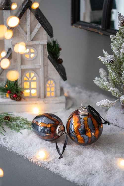 Egg Christmas ornaments styled with holiday decor