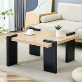 Minimalist MDF Coffee Table in modern living room, showcasing its clean lines and black leg accents for a sleek furniture upgrade.