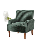 Green ribbed armchair in a room with large windows and a white rug.