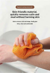 An orange mesh body washcloth being used on a person&