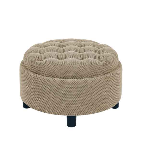 Beige round ottoman with tufted top on a white background