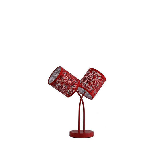 Red table lamp with two floral-patterned shades on a white background