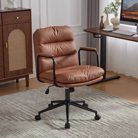 Brown ergonomic office chair with padded seat and backrest in a home office setup. Ideal for comfort and support during long work hours.
