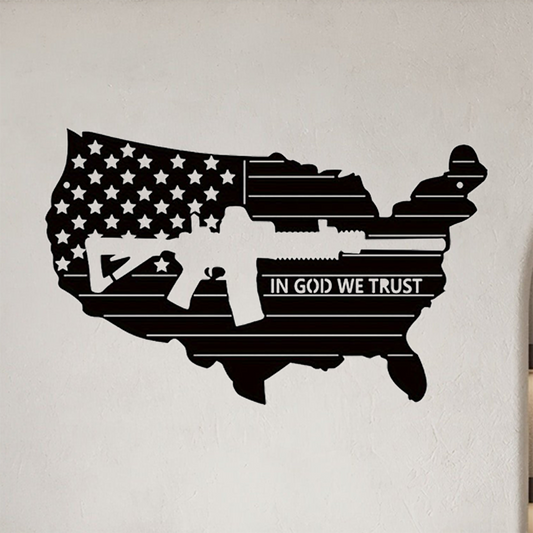 American flag iron wall art shaped like the USA with rifle silhouette and 'In God We Trust' text, ideal patriotic wall decor for home or office.
