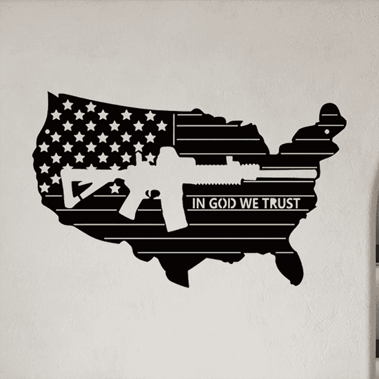 American flag iron wall art shaped like the USA with rifle silhouette and &