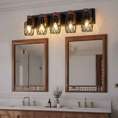A four-light wall sconce with black metal wire mesh cages and warm glowing bulbs, mounted above two wooden-framed mirrors in a bathroom setting.