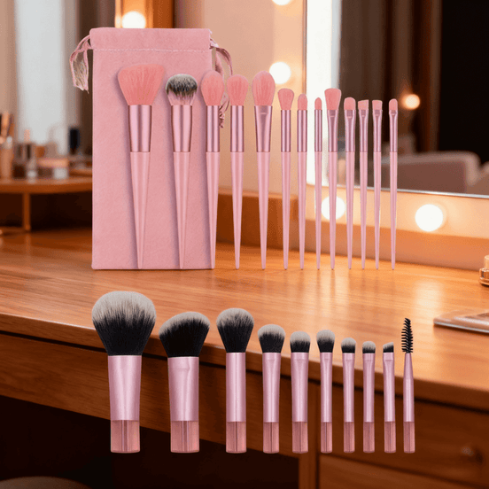 Essential 23 PCS mini brush set displayed on vanity, featuring durable pink brushes with storage bag. Perfect for makeup application and storage.