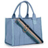 Blue tote bag with a striped shoulder strap on a white background