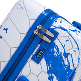 Blue and white suitcase with a combination lock on a geometric patterned background
