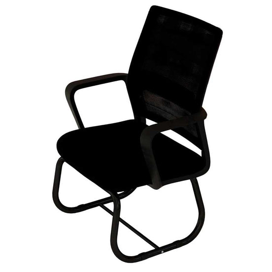 Black office chair in a room with red cabinets and a white rug.