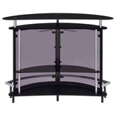 Straight-on back view of black glass top home wine bar cabinet with dual-tier shelving and chrome support bars.