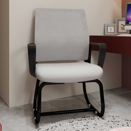Gray office chair with black frame in a room setting