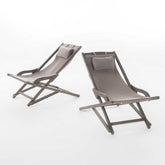 Outdoor sling chairs with pillows for relaxation