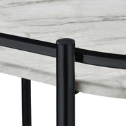 Close-up of faux marble serving cart shelf showing realistic marble texture and smooth black metal frame detailing.