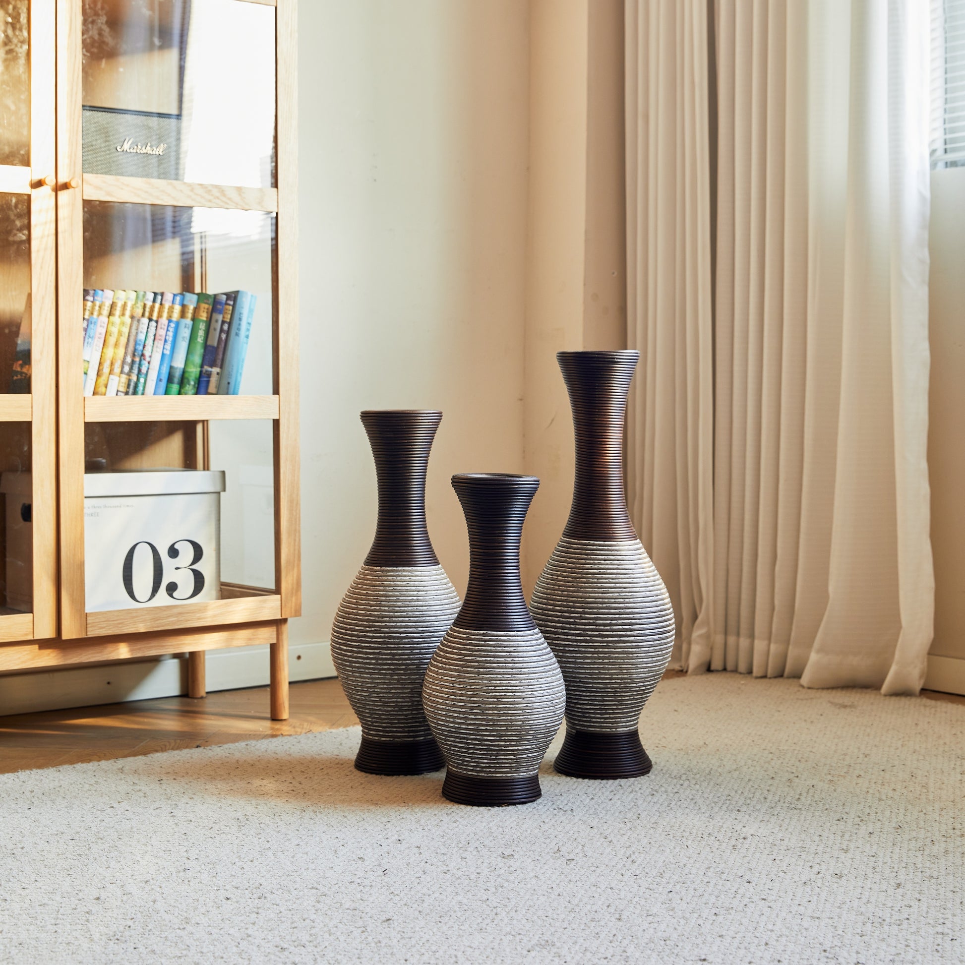 Brown floor vase set of 3 in a sunlit room corner, ideal for displaying dried flowers and elevating modern home aesthetics.