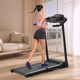 Woman running on treadmill in living room