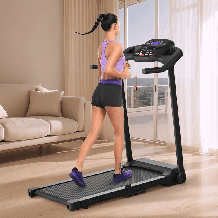 Woman running on treadmill in living room