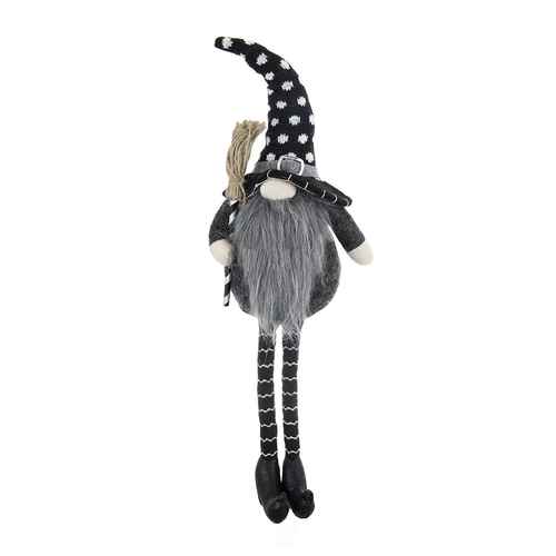 Close-up of a black gnome Halloween ornament featuring a tall polka dot hat, gray beard, and striped legs, crafted for seasonal decor.