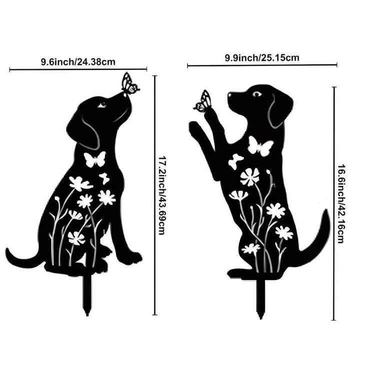 Dimensions of two black dog-shaped garden stakes with floral and butterfly designs on a white background.