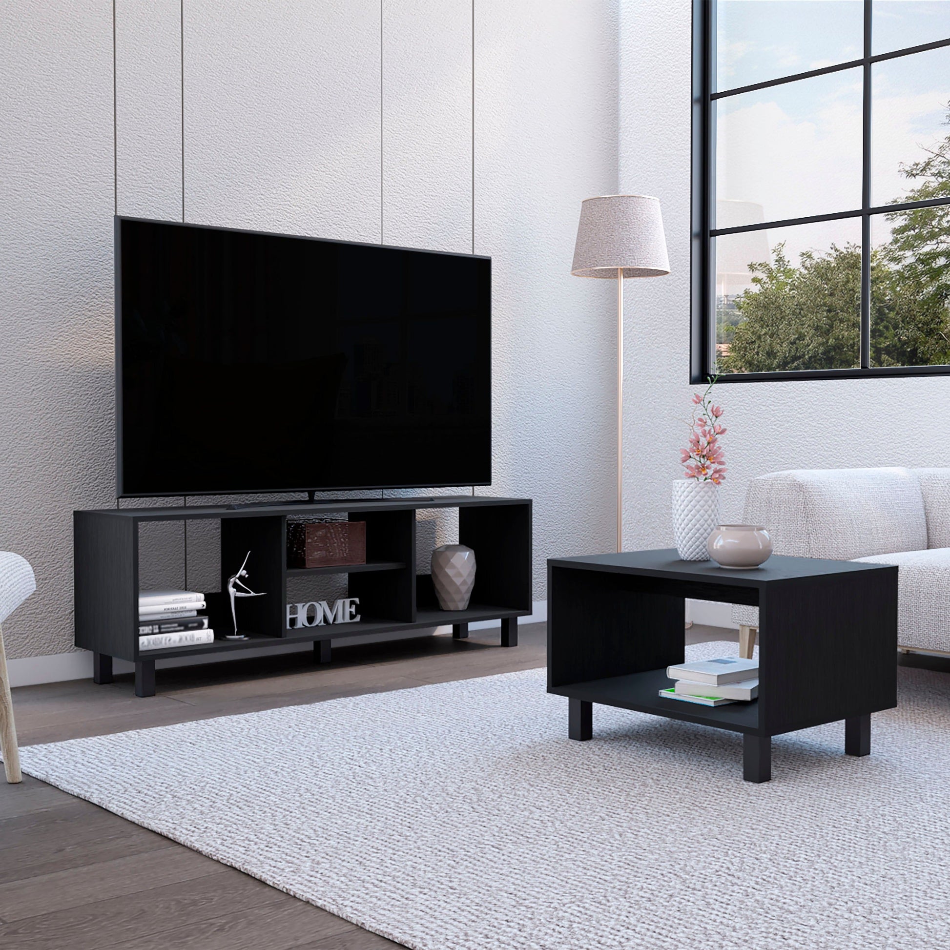 Carter Black Living Room Set with TV Stand and Coffee Table in modern space. Black TV stand with open shelves and matching coffee table.