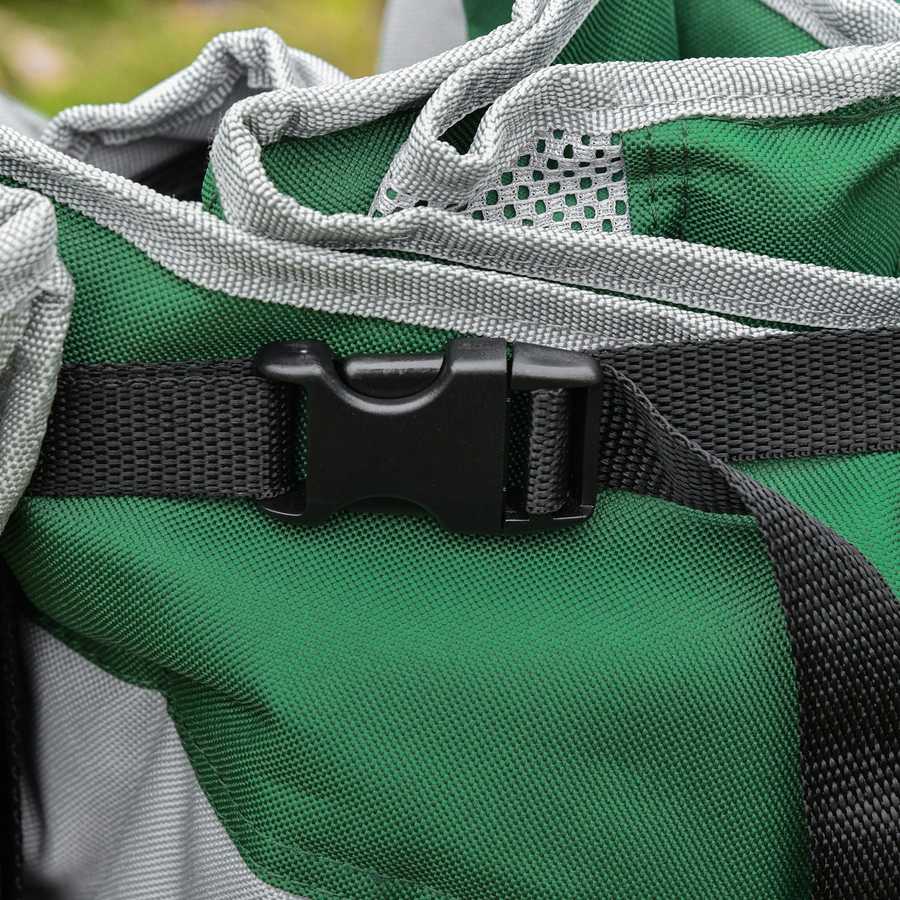 Close-up of a green bag with gray straps and a black buckle.