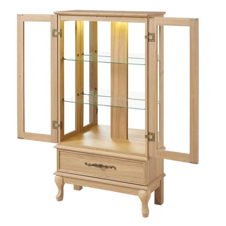 Open lighted curio cabinet with two glass shelves and bottom drawer, showing spacious interior and elegant wood finish.