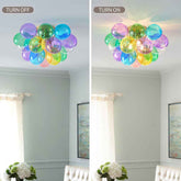 Colorful ceiling light fixture before and after turning on in a room with light blue walls and white curtains.