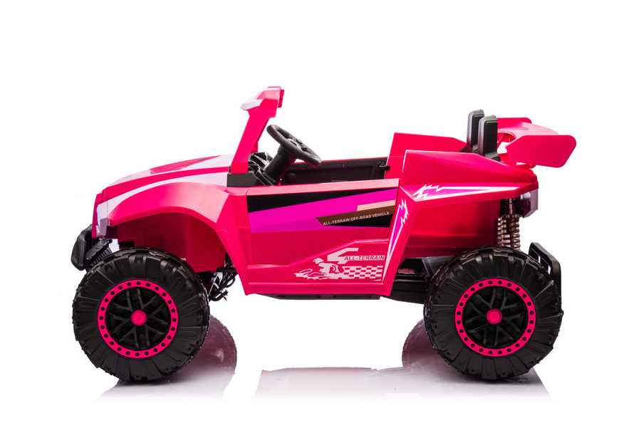 Pink kids ride on car with off-road tires and safety features