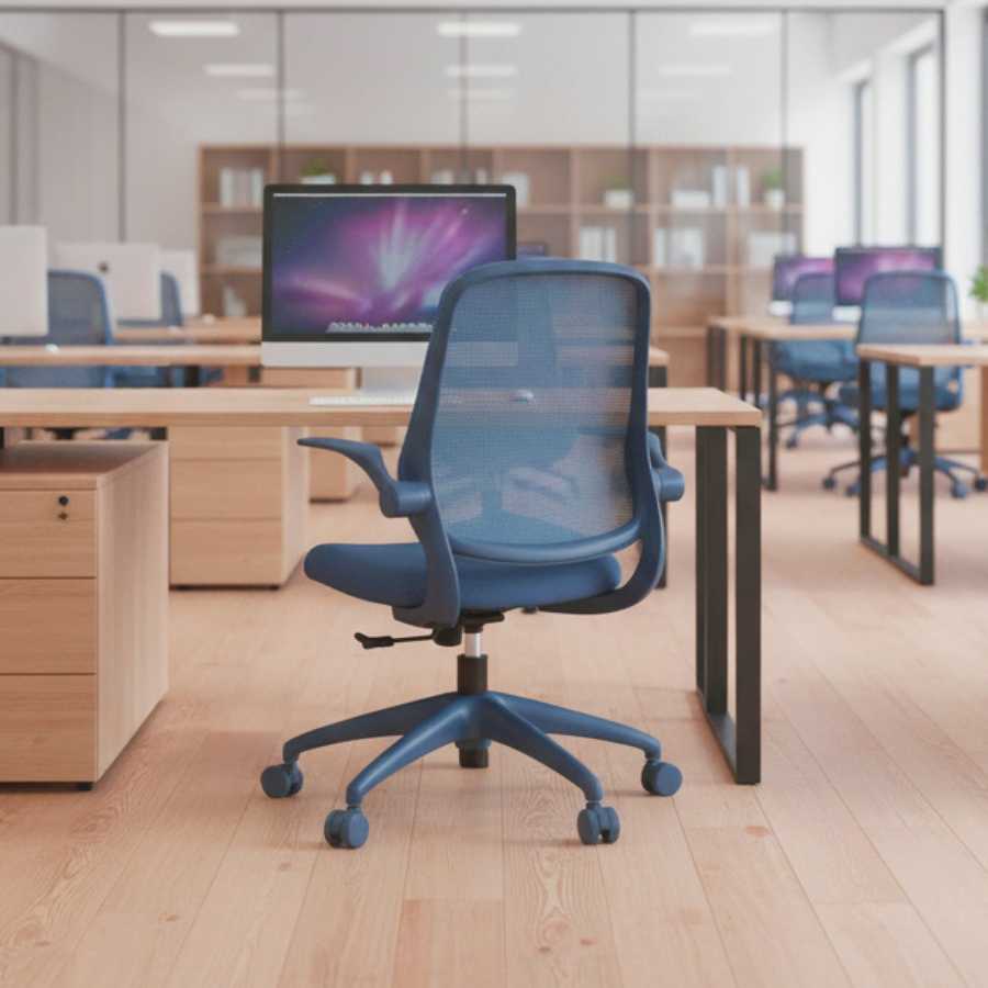 Blue office chair in a modern office setting with desks and computers.