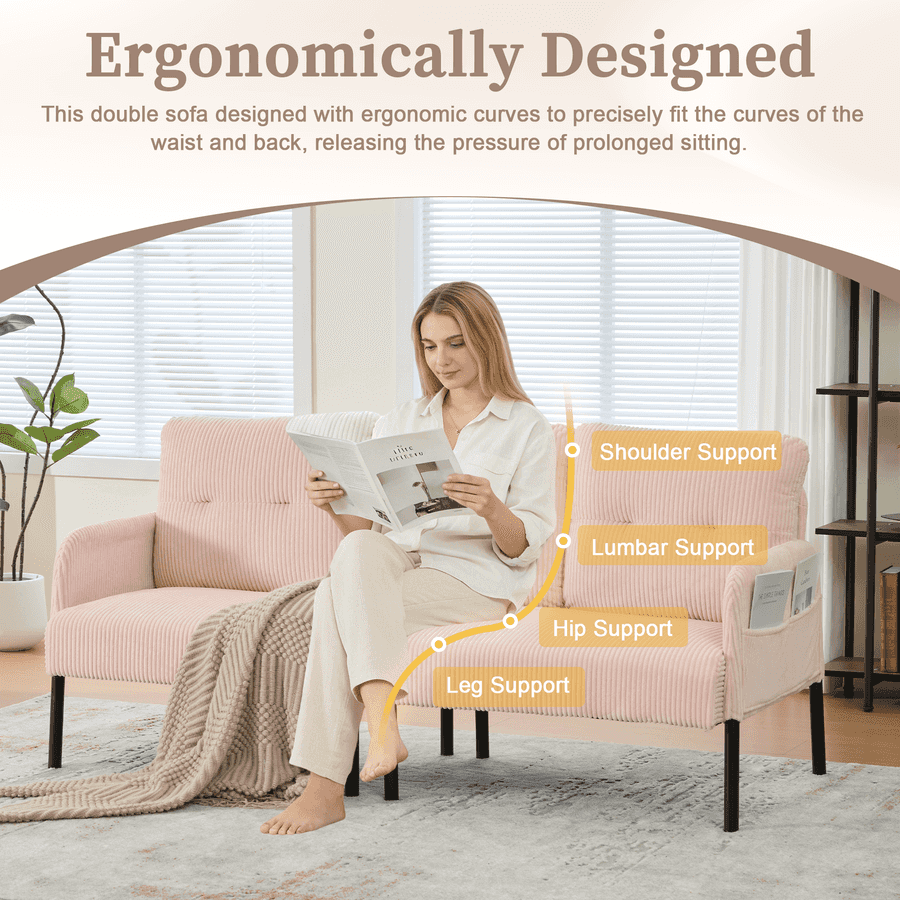Woman reading a magazine on a pink sofa with ergonomic features highlighted.