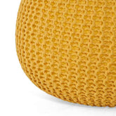 Close-up of a textured yellow cushion on a white background