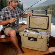 Man fishing by a lake with a cooler containing fish